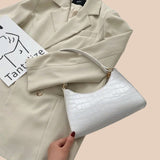 Eline. Bolsa de Couro Brilhante