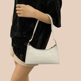 Eline. Bolsa de Couro Brilhante