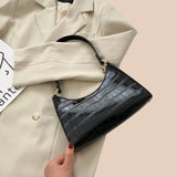 Eline. Bolsa de Couro Brilhante