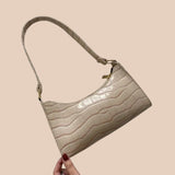 Eline. Bolsa de Couro Brilhante