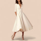 Tania - Vestido com decote em V